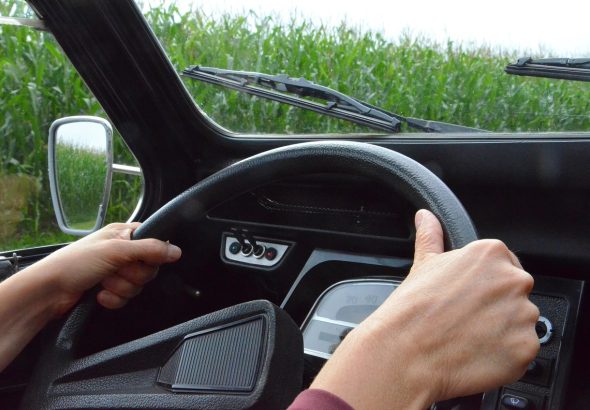 woman driving while using wipers