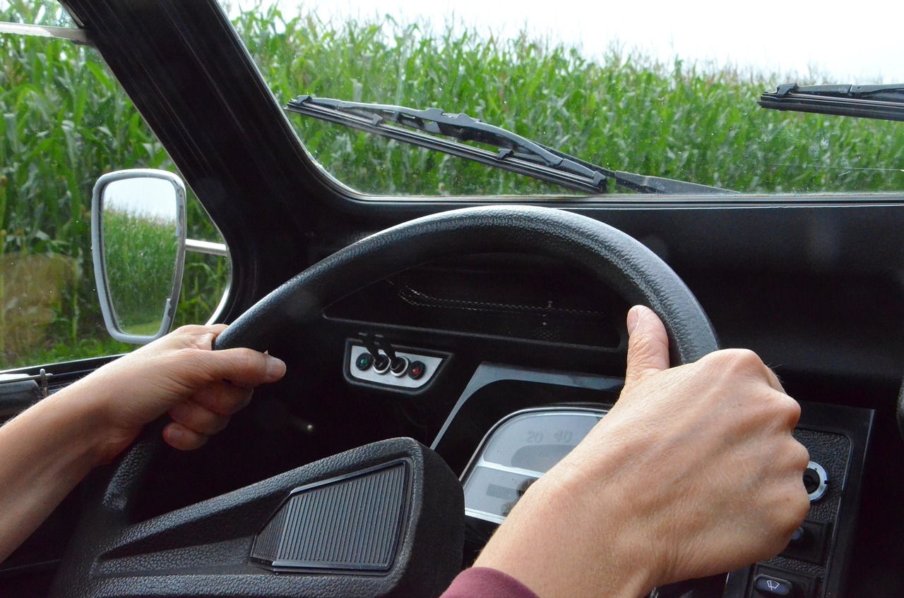 woman driving while using wipers
